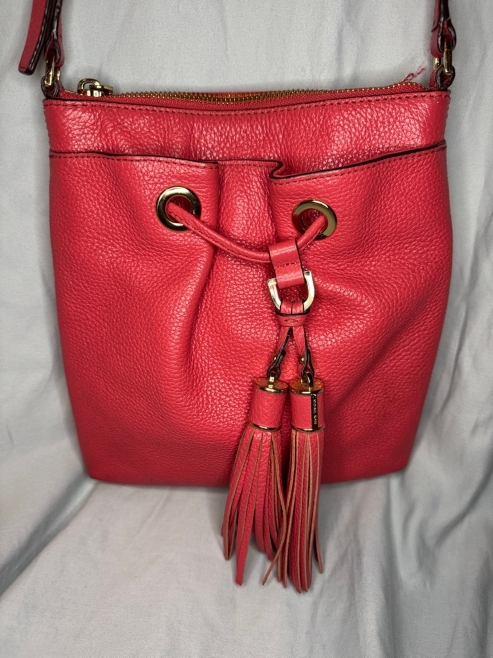Michael Kors Pebbled Leather Tassel Crossbody Bag Coral Pink Gold Tone